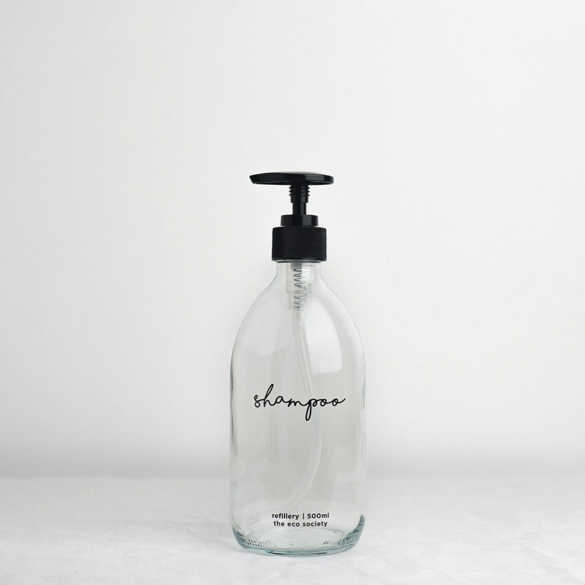 Clear Glass Bottle with Black printed text "Shampoo" 500ml Refillery Bottle