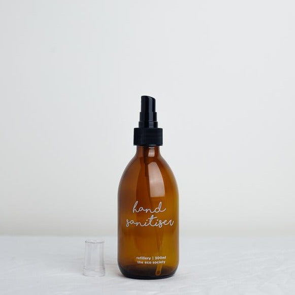 Refillable Hand Sanitiser Amber glass bottle printed with white text